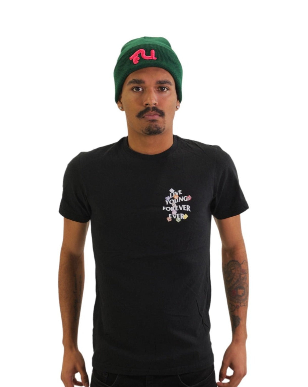Front view of a model wearing a black t-shirt. On the left chest is a small logo that reads 'LIVE YOUNG FOREVER' surrounded by small, colorful alphabet blocks.