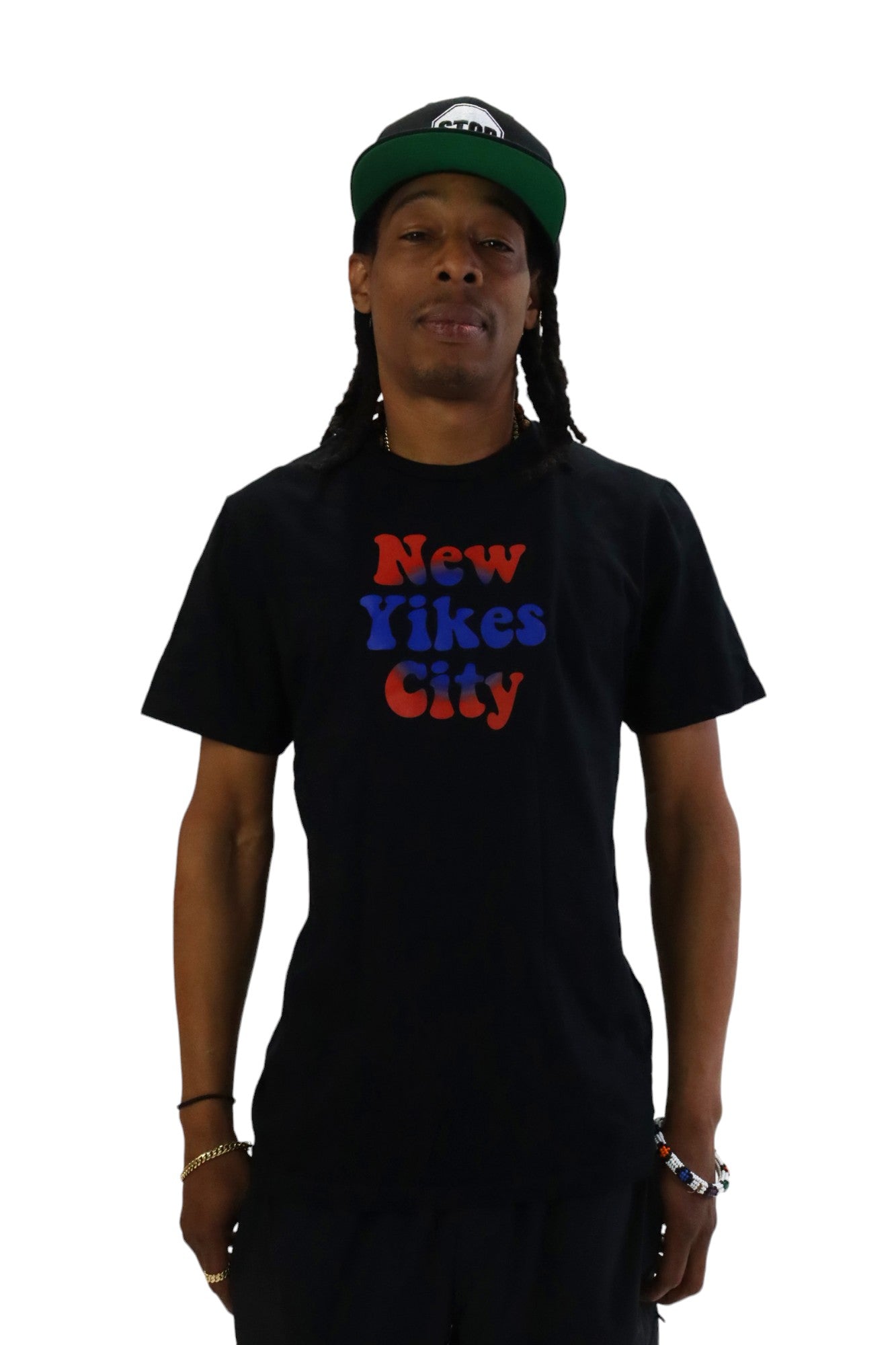 Front view of a model wearing a black t-shirt with the words 'New Yikes City' printed on the chest in a red and blue bubbly font.