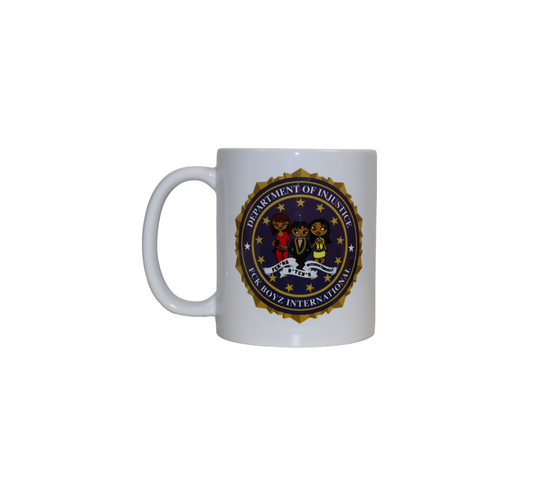Front view of a white ceramic mug. The mug has a satirical graphic designed like an official government seal that reads 'Department of Injustice' and 'Fuck Boyz International'.