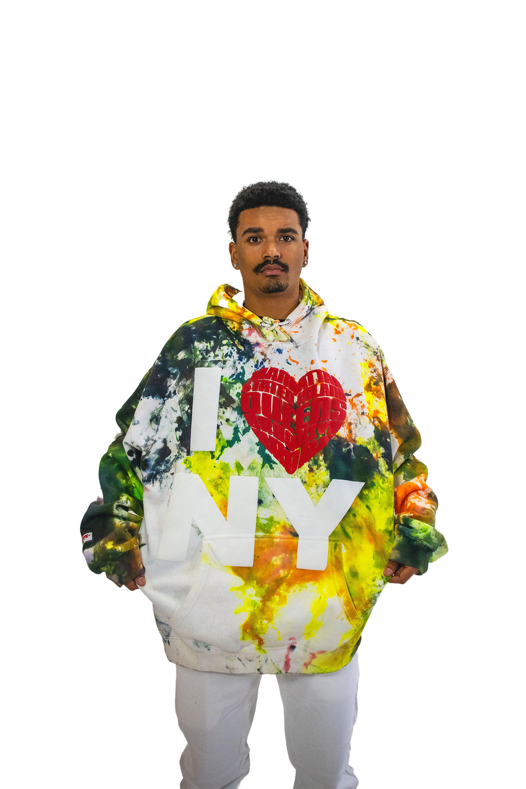 Model showcasing the oversized fit of a chaotic tie-dye hoodie, featuring a large, textured 'I ❤️ NY' graphic on the chest.