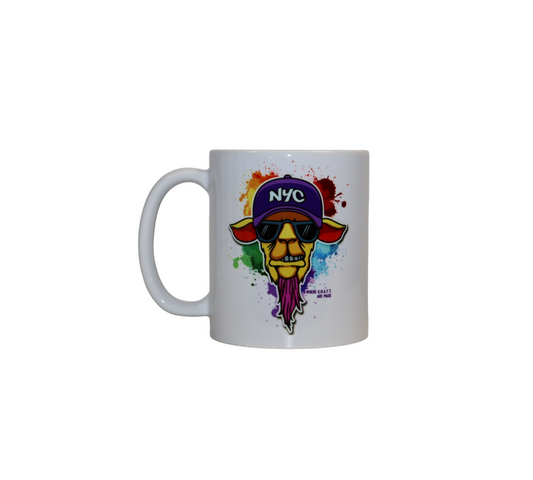 A white ceramic mug with a colorful graphic of a yellow goat character. The goat wears a purple 'NYC' hat and sunglasses, and is set against a vibrant, rainbow-colored paint splatter background.