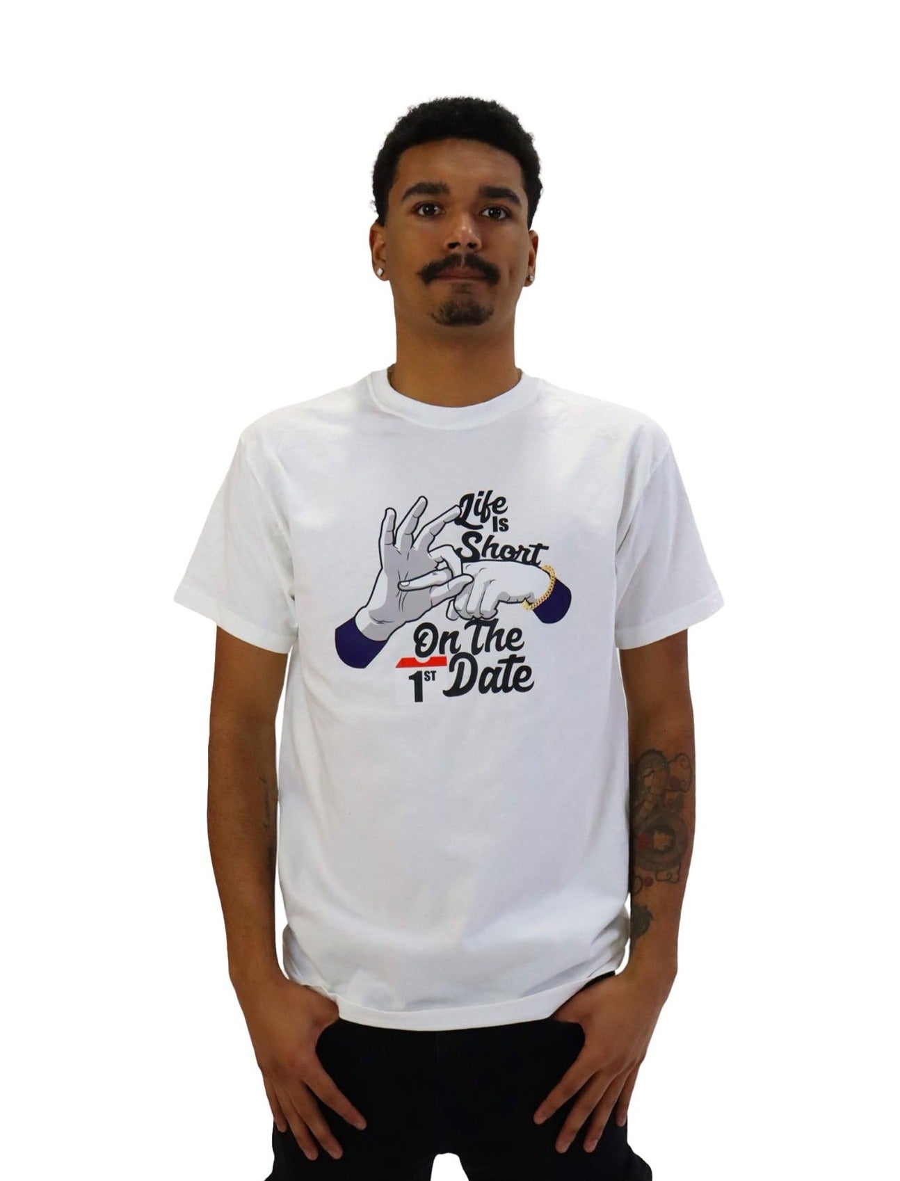 Front view of a model wearing a white t-shirt with a provocative graphic. The design combines text and hand gestures to convey the explicit phrase 'Life is short, fuck on the first date'.