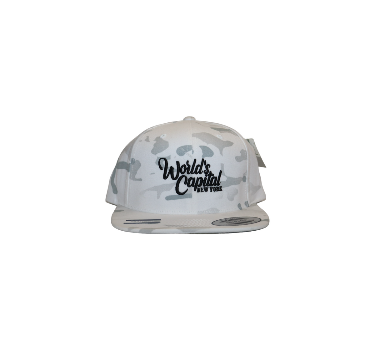A snapback hat with a white and grey urban camouflage pattern. The words 'World's Capital of NEW YORK' are embroidered on the front in black.